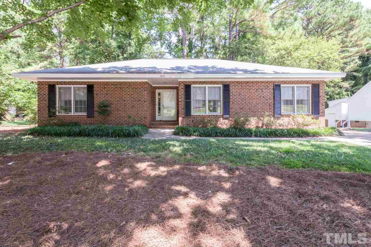 3000 Sylvania Drive Raleigh, NC 27607 - Photo 1 of 25 a view of a house with yard and tree s