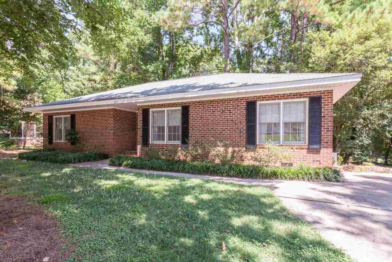 3000 Sylvania Drive Raleigh, NC 27607 - Photo 3 of 25 a view of house with a yard