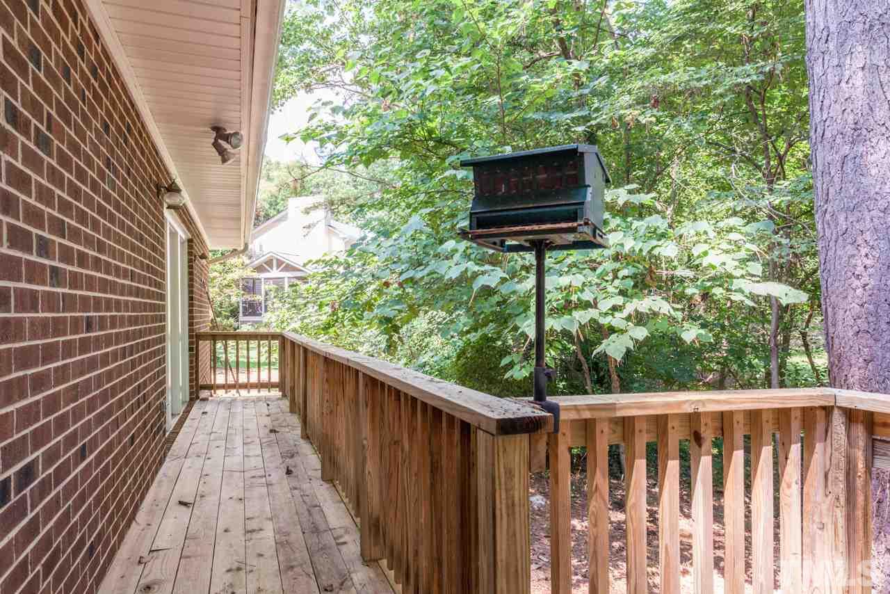 3000 Sylvania Drive Raleigh, NC 27607 - Photo 6 of 25 a view of a balcony with wooden floor