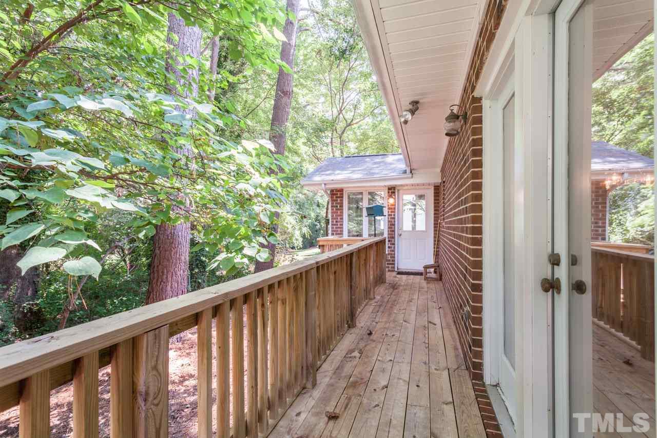 3000 Sylvania Drive Raleigh, NC 27607 - Photo 7 of 25 a view of a balcony with wooden floor