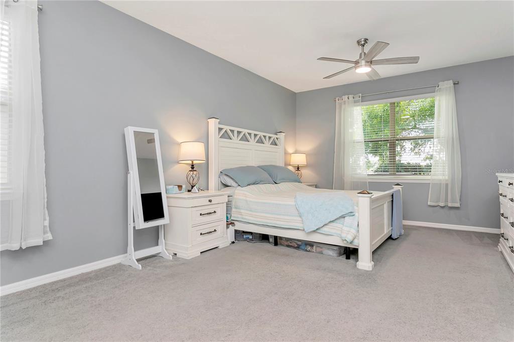11701 Brighton Knoll Loop Riverview, FL 33579 - Photo 22 of 70 a bedroom with a bed and a window