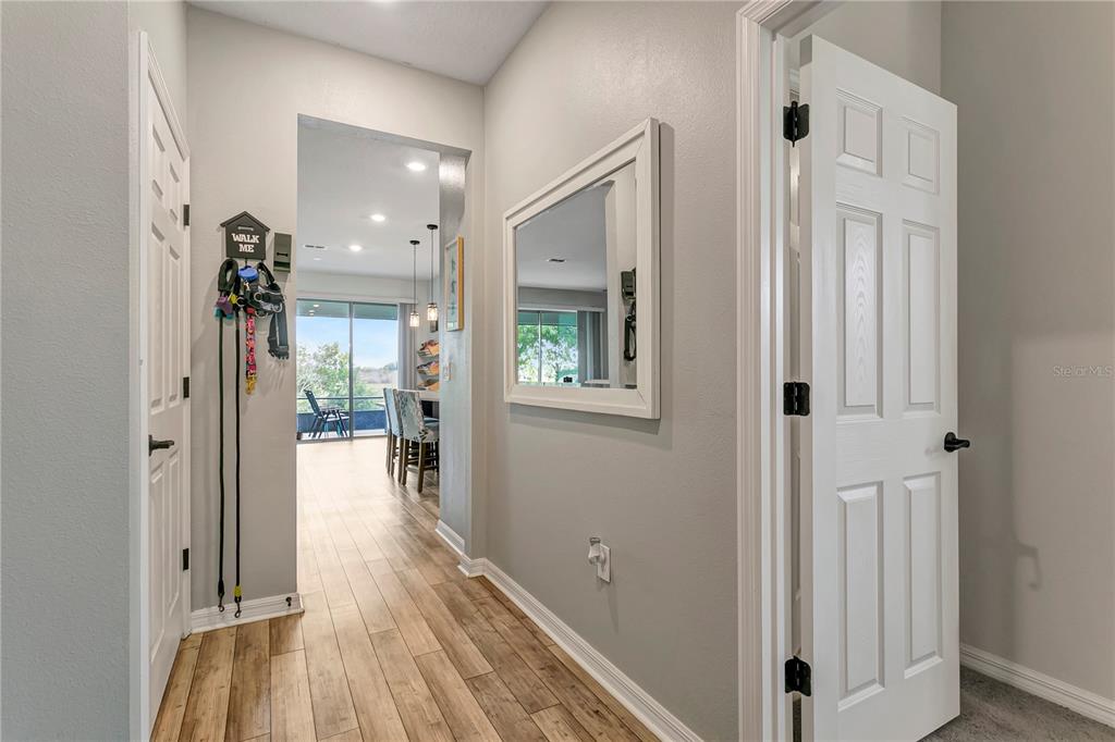 11701 Brighton Knoll Loop Riverview, FL 33579 - Photo 27 of 70 a view of a hallway with wooden floor and closet area
