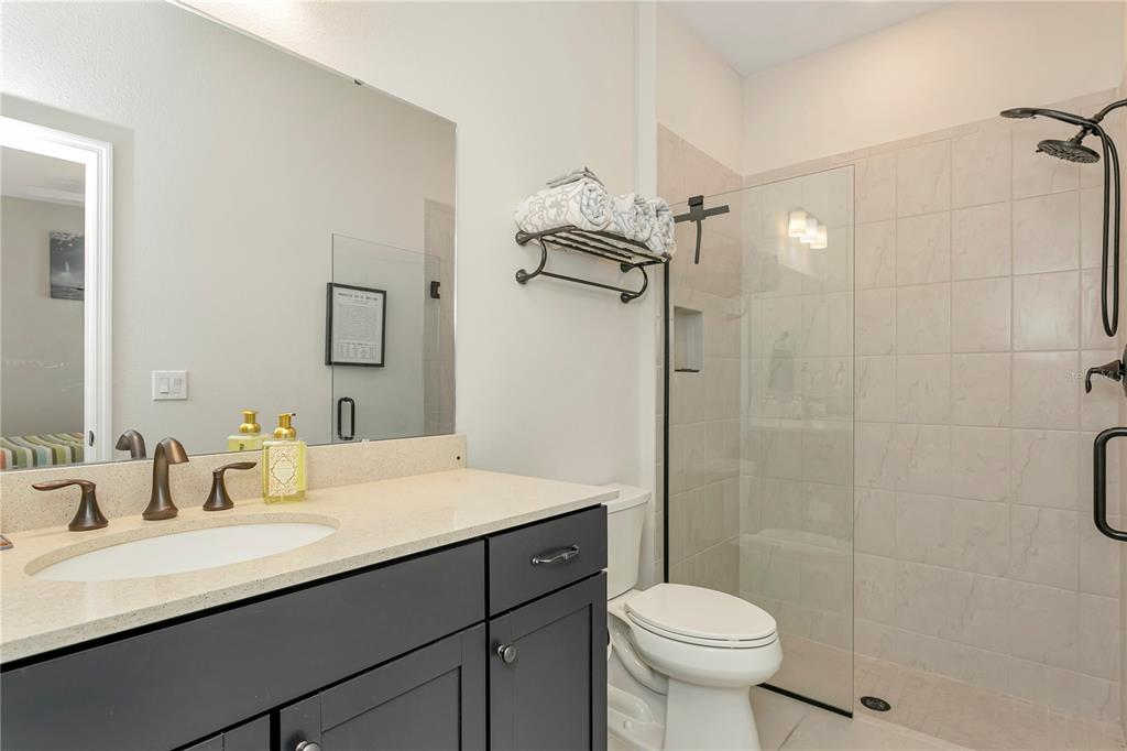 11701 Brighton Knoll Loop Riverview, FL 33579 - Photo 30 of 70 a bathroom with a sink toilet and shower