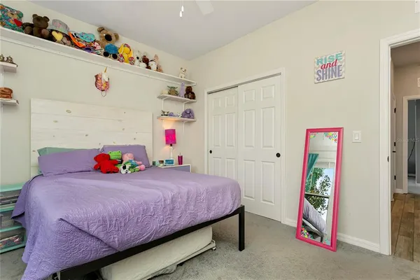 a view of game room with window and couch