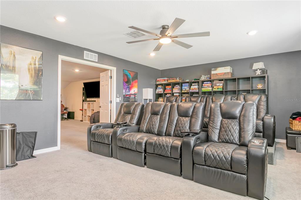 11701 Brighton Knoll Loop Riverview, FL 33579 - Photo 45 of 70 a living room with furniture and a ceiling fan