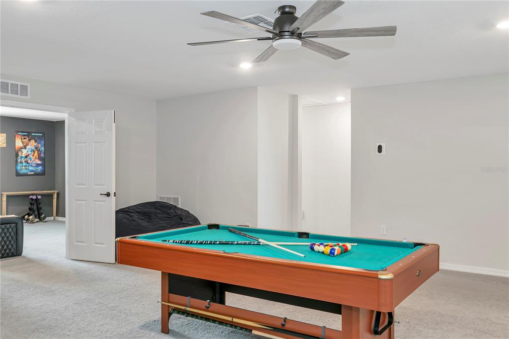 11701 Brighton Knoll Loop Riverview, FL 33579 - Photo 46 of 70 a room with pool table and fan
