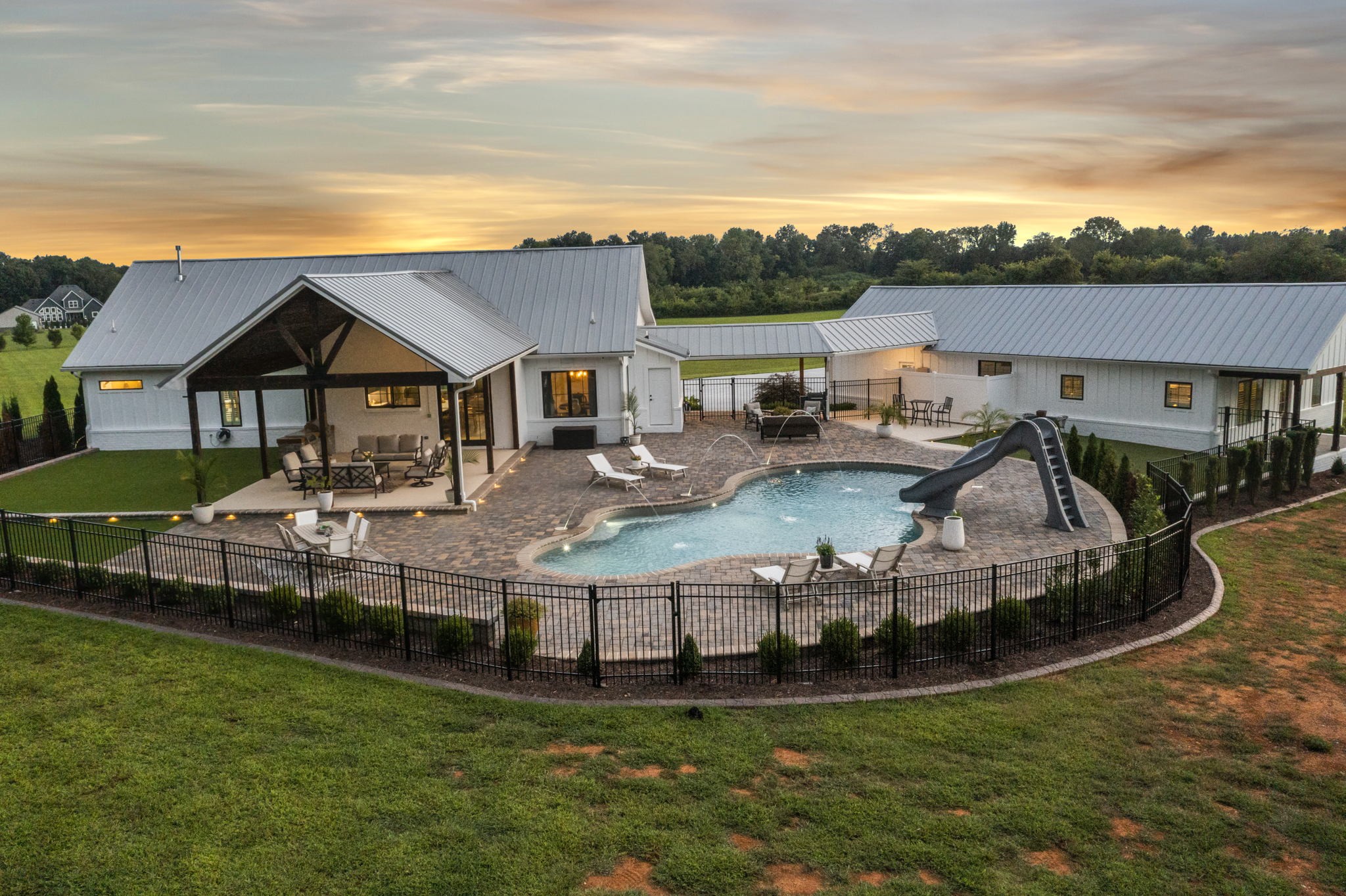 8518 Newtown Road Rockvale, TN 37153 - Photo 23 of 69 a view of a house with a big yard and sitting area