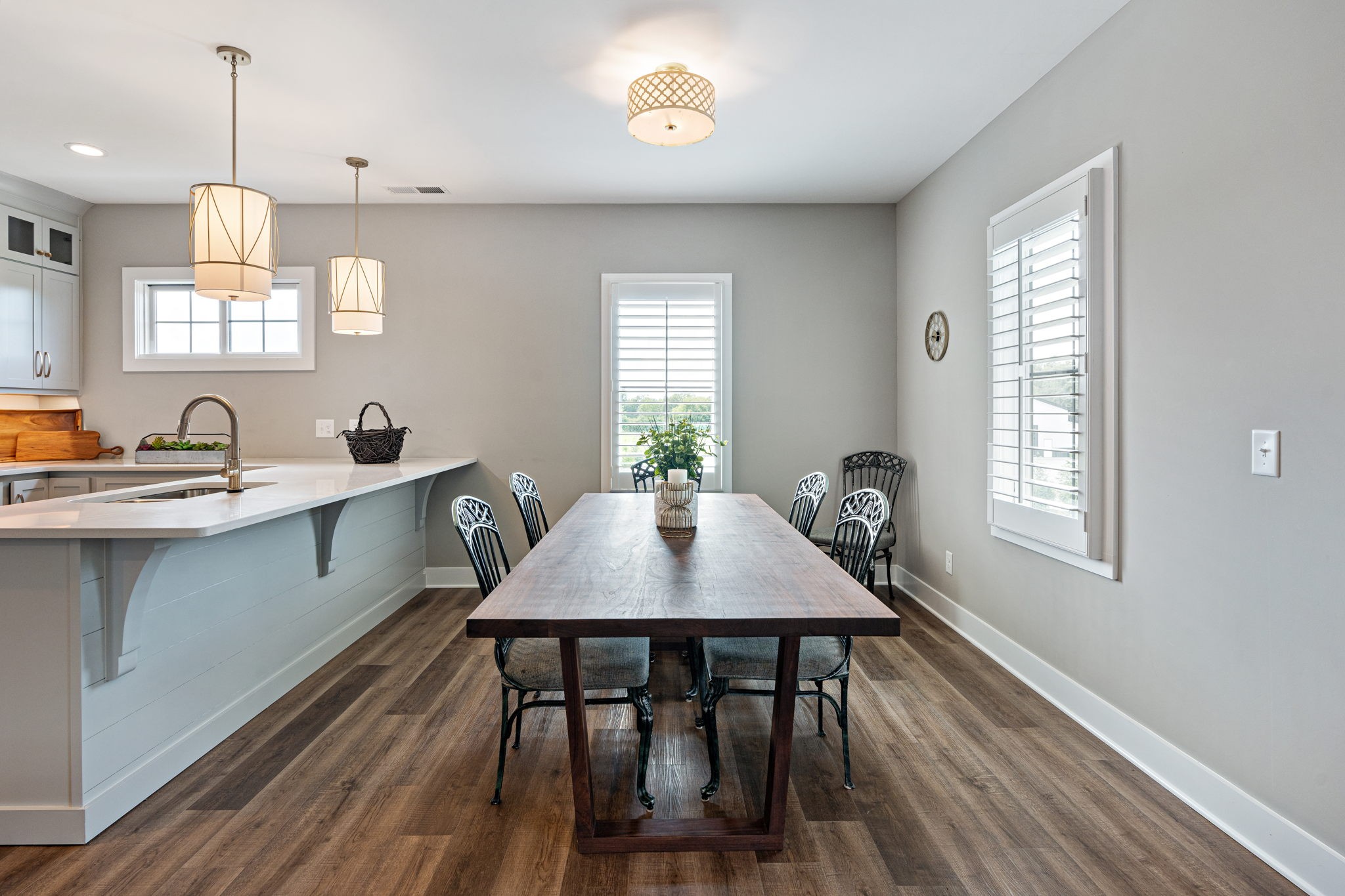 8518 Newtown Road Rockvale, TN 37153 - Photo 33 of 69 a kitchen with a dining table chairs and sink