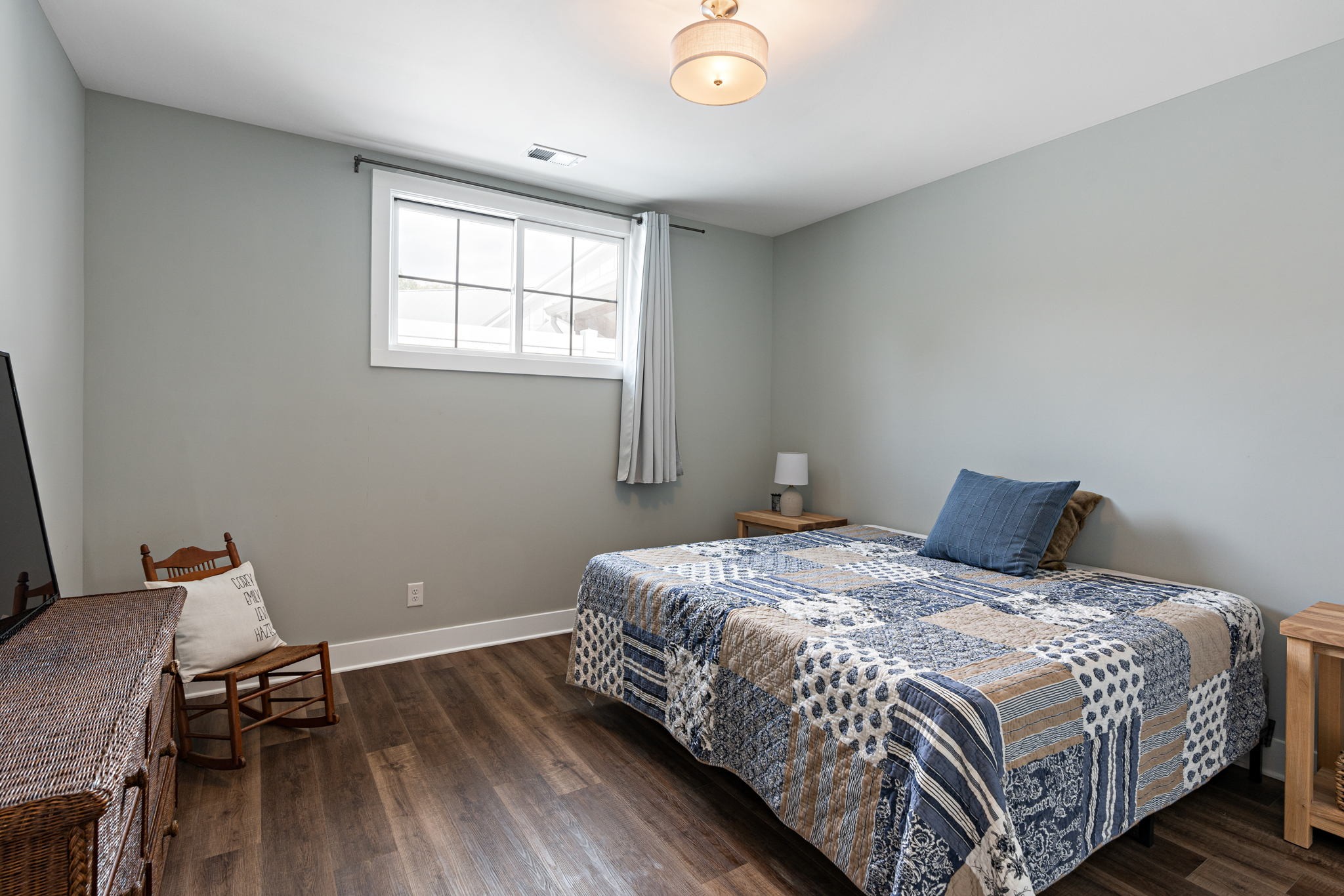 8518 Newtown Road Rockvale, TN 37153 - Photo 37 of 69 a bedroom with a bed and wooden floor