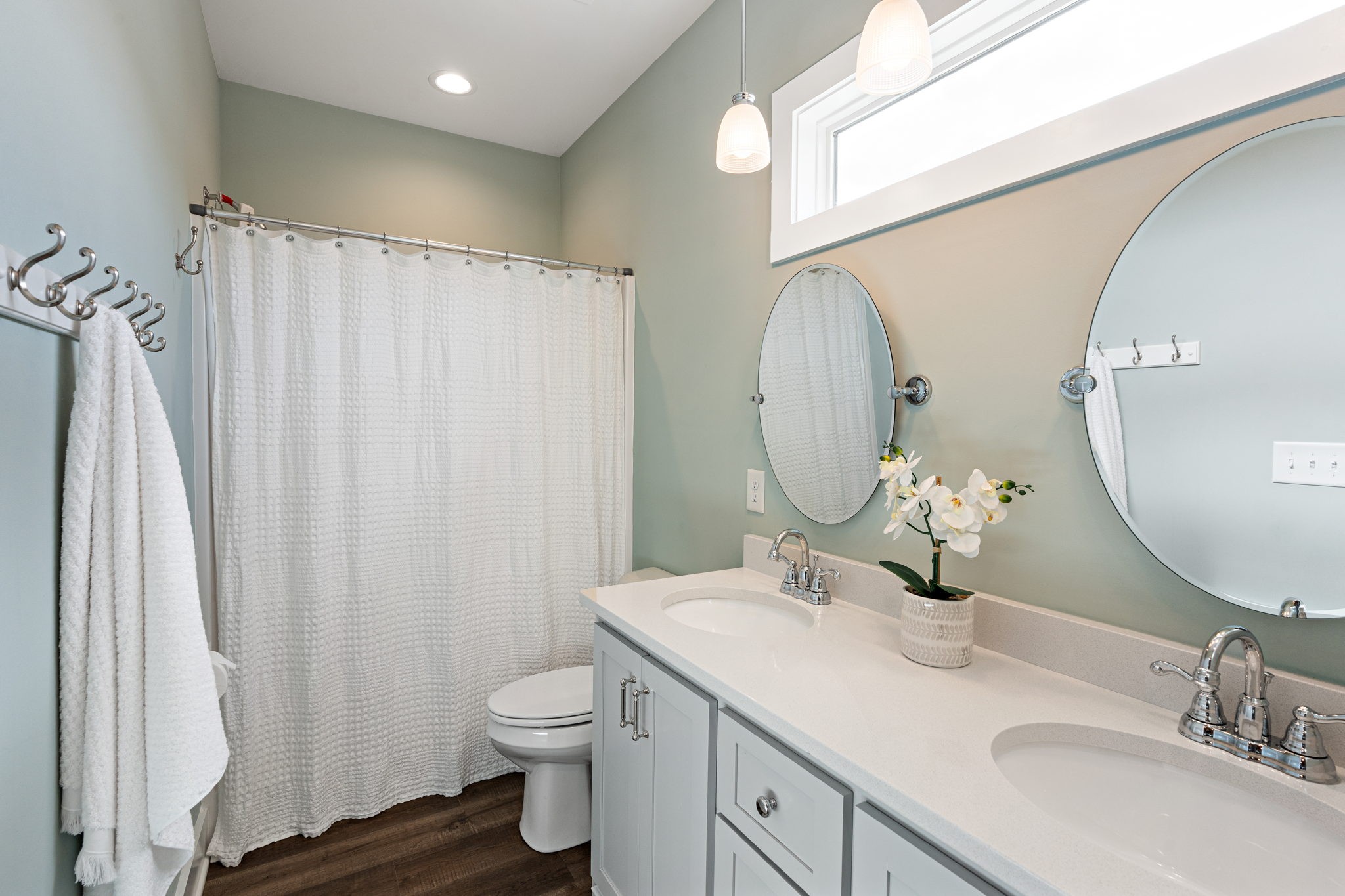 8518 Newtown Road Rockvale, TN 37153 - Photo 38 of 69 a bathroom with a double vanity sink toilet and a mirror