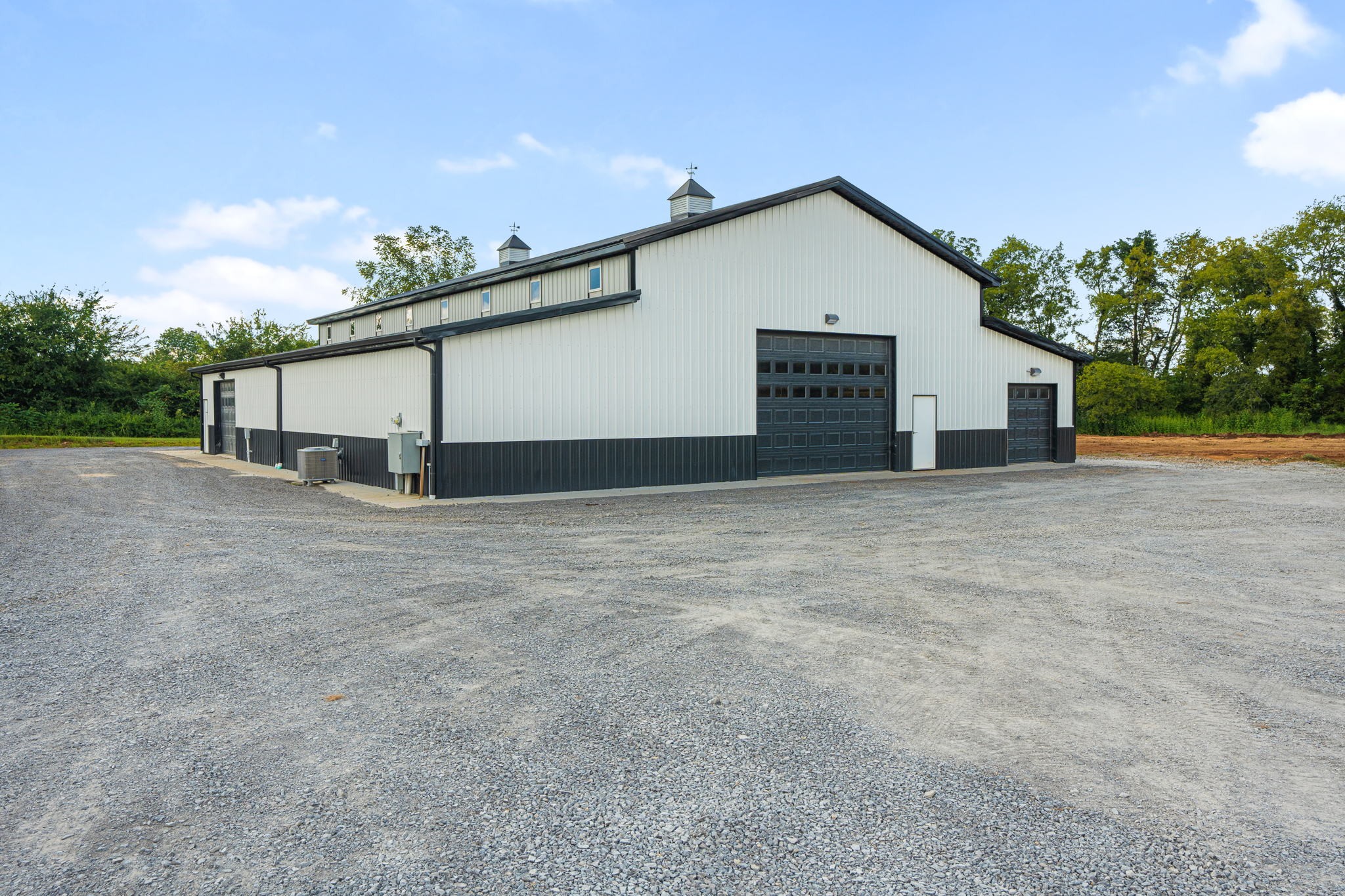 8518 Newtown Road Rockvale, TN 37153 - Photo 41 of 69 a view of a house with a yard and garage