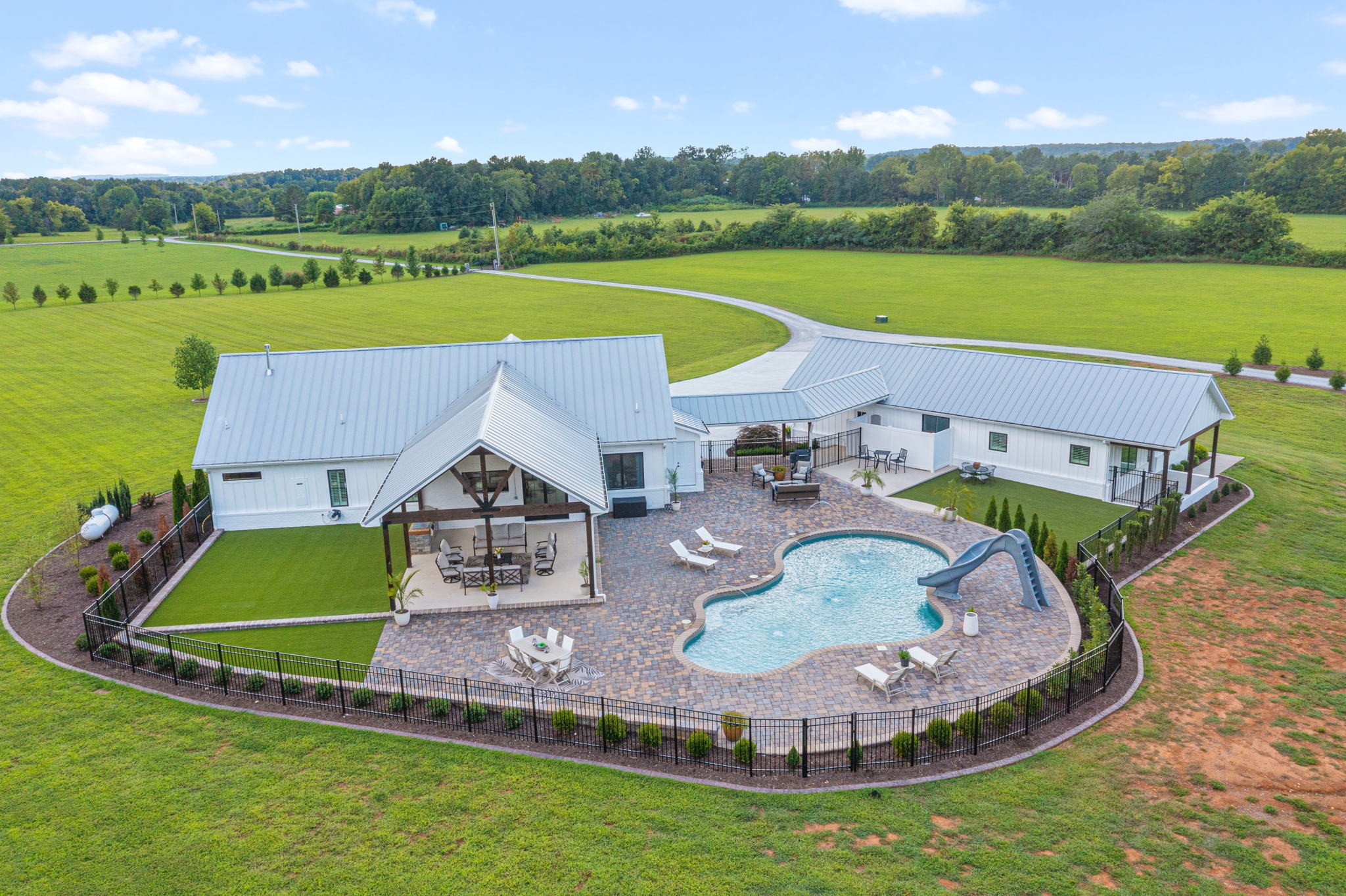 8518 Newtown Road Rockvale, TN 37153 - Photo 50 of 69 an aerial view of a house with a big yard