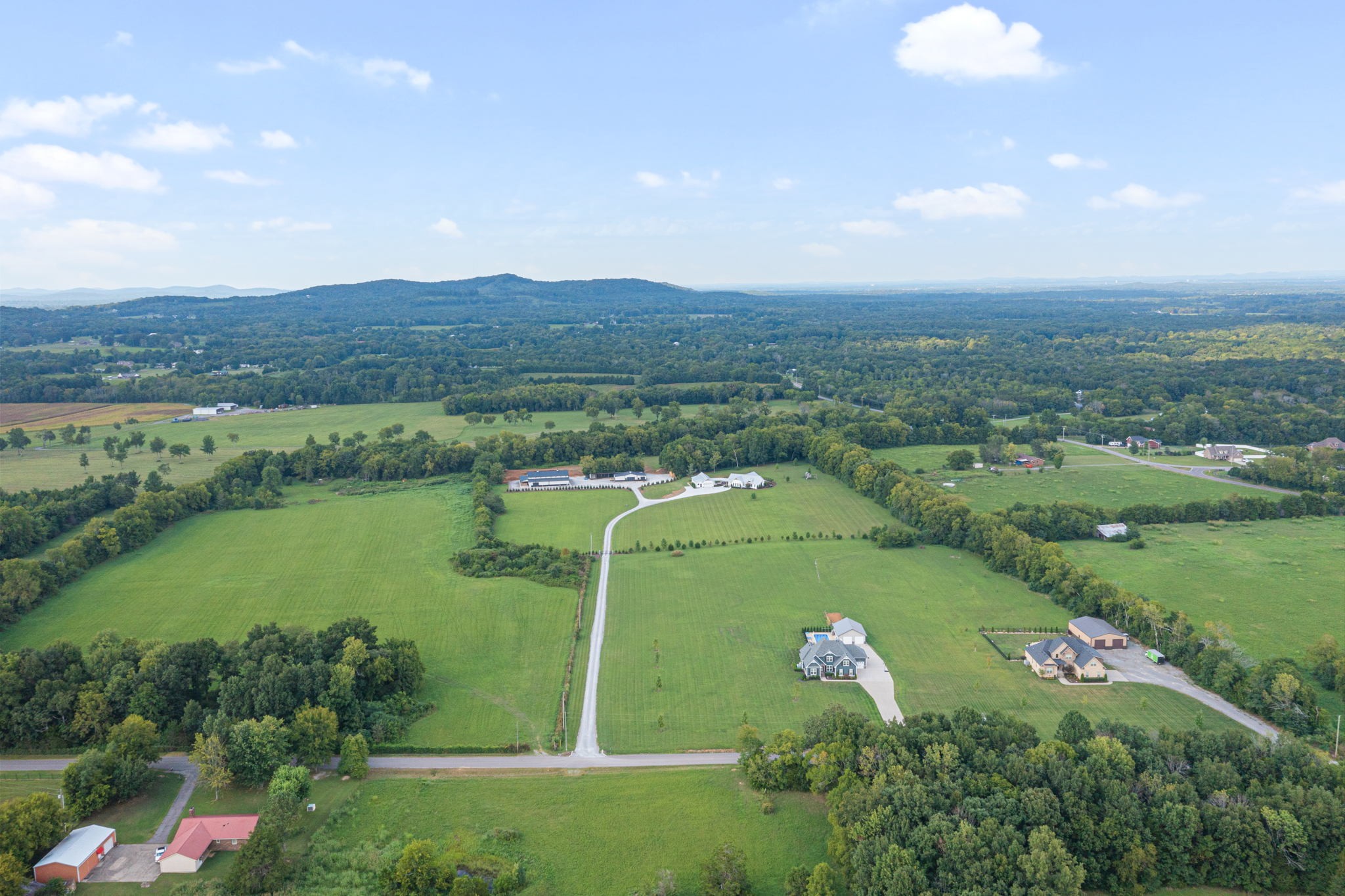 8518 Newtown Road Rockvale, TN 37153 - Photo 62 of 69 an aerial view of a golf course with chairs