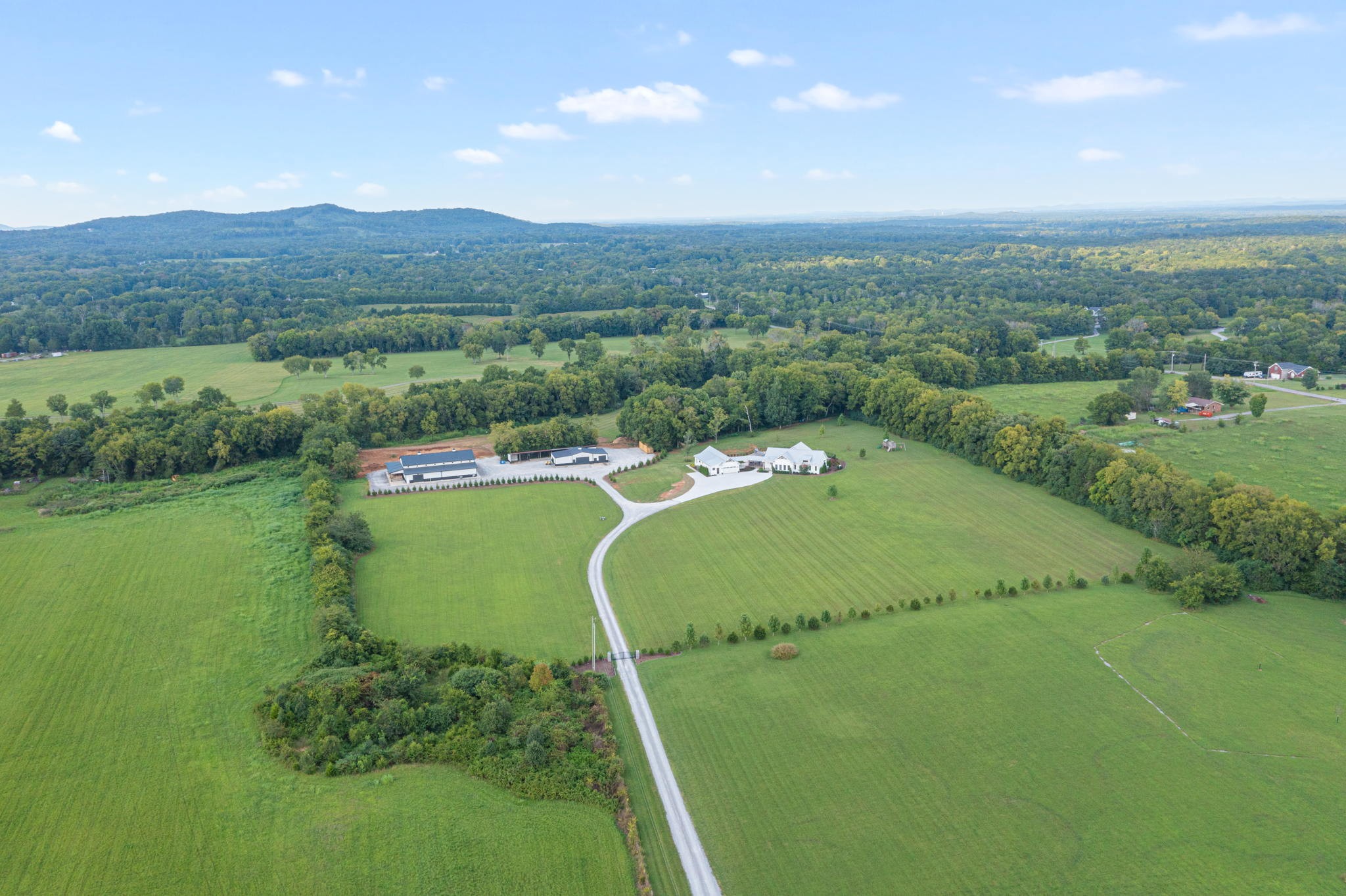 8518 Newtown Road Rockvale, TN 37153 - Photo 63 of 69 a view of a golf course with a lake