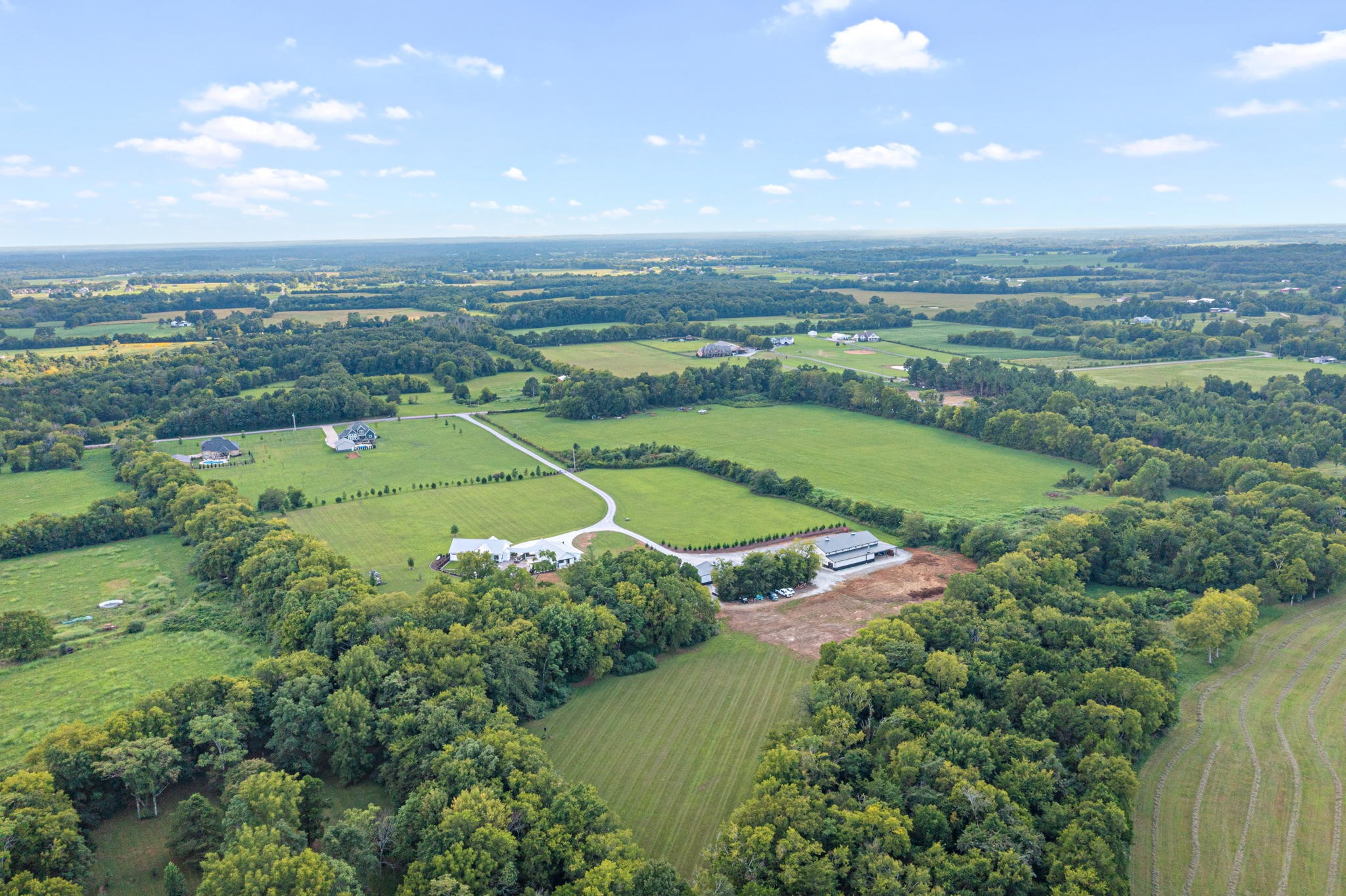 8518 Newtown Road Rockvale, TN 37153 - Photo 67 of 69 an aerial view of a houses with a yard and lake
