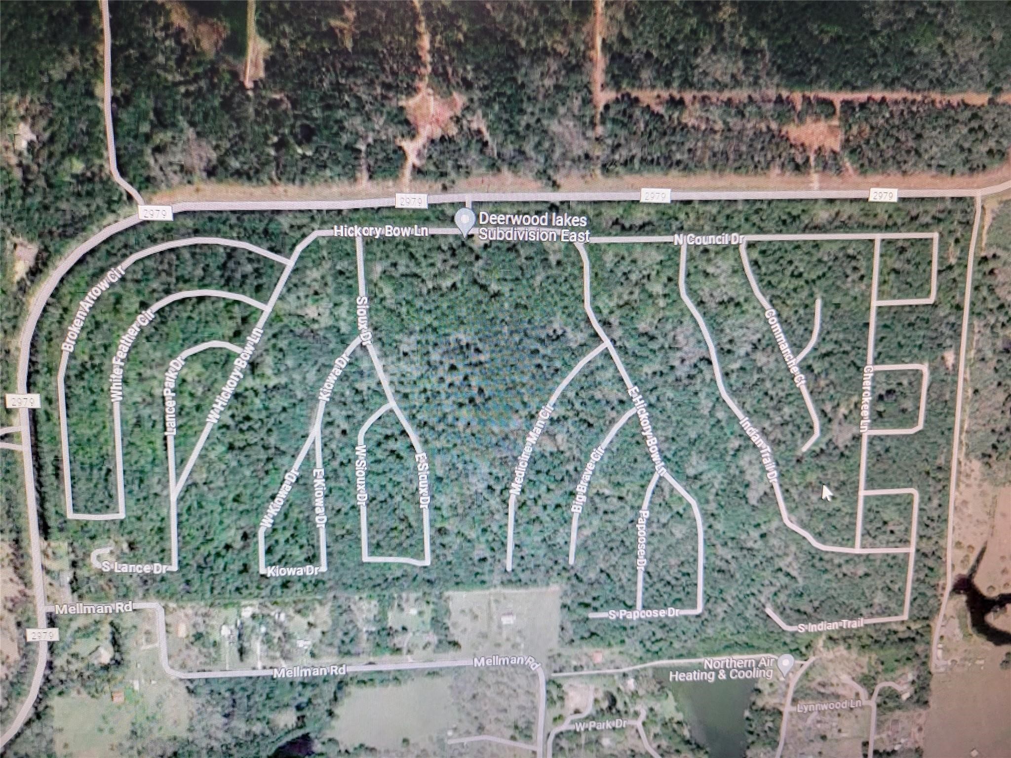 front view of a house with a garden