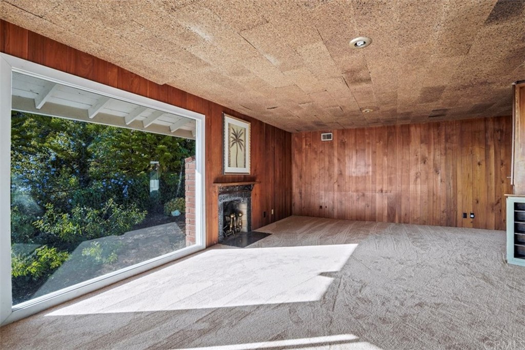 595 Windsor Place Laguna Beach, CA 92651 - Photo 11 of 26 a view of a porch with a fireplace