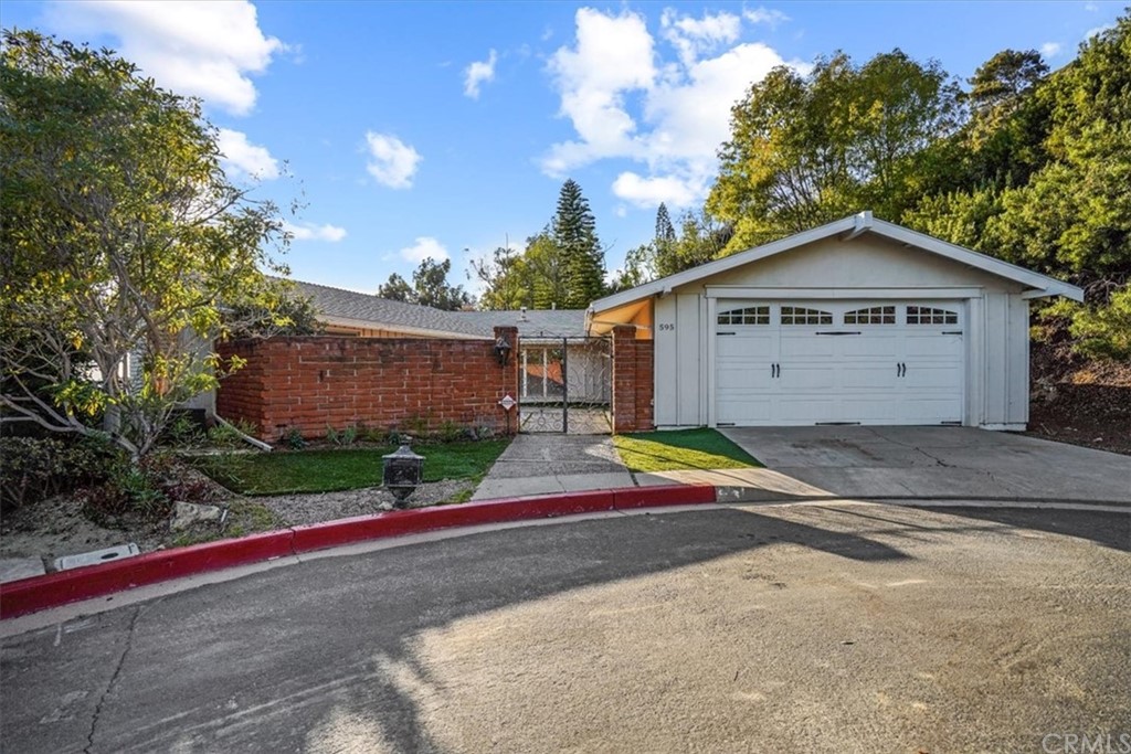 595 Windsor Place Laguna Beach, CA 92651 - Photo 2 of 26 a view of garage yard and entertaining space