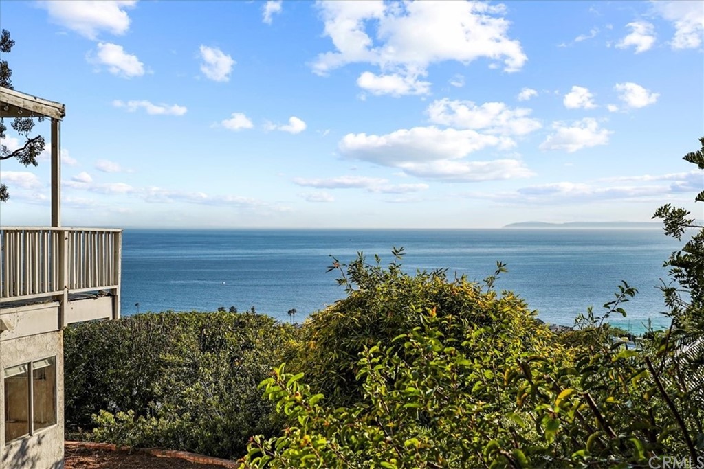 595 Windsor Place Laguna Beach, CA 92651 - Photo 21 of 26 a view of a lake with a building in the background
