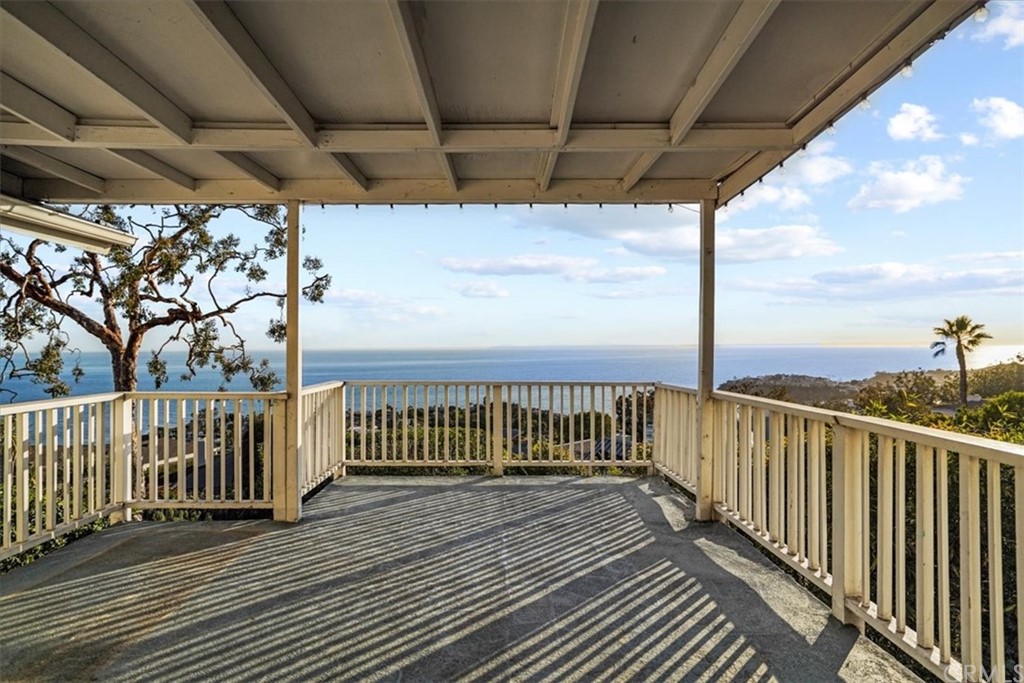 595 Windsor Place Laguna Beach, CA 92651 - Photo 10 of 26 a view of deck with wooden floor barbeque oven and trees
