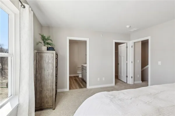 a view of a bedroom from bathroom
