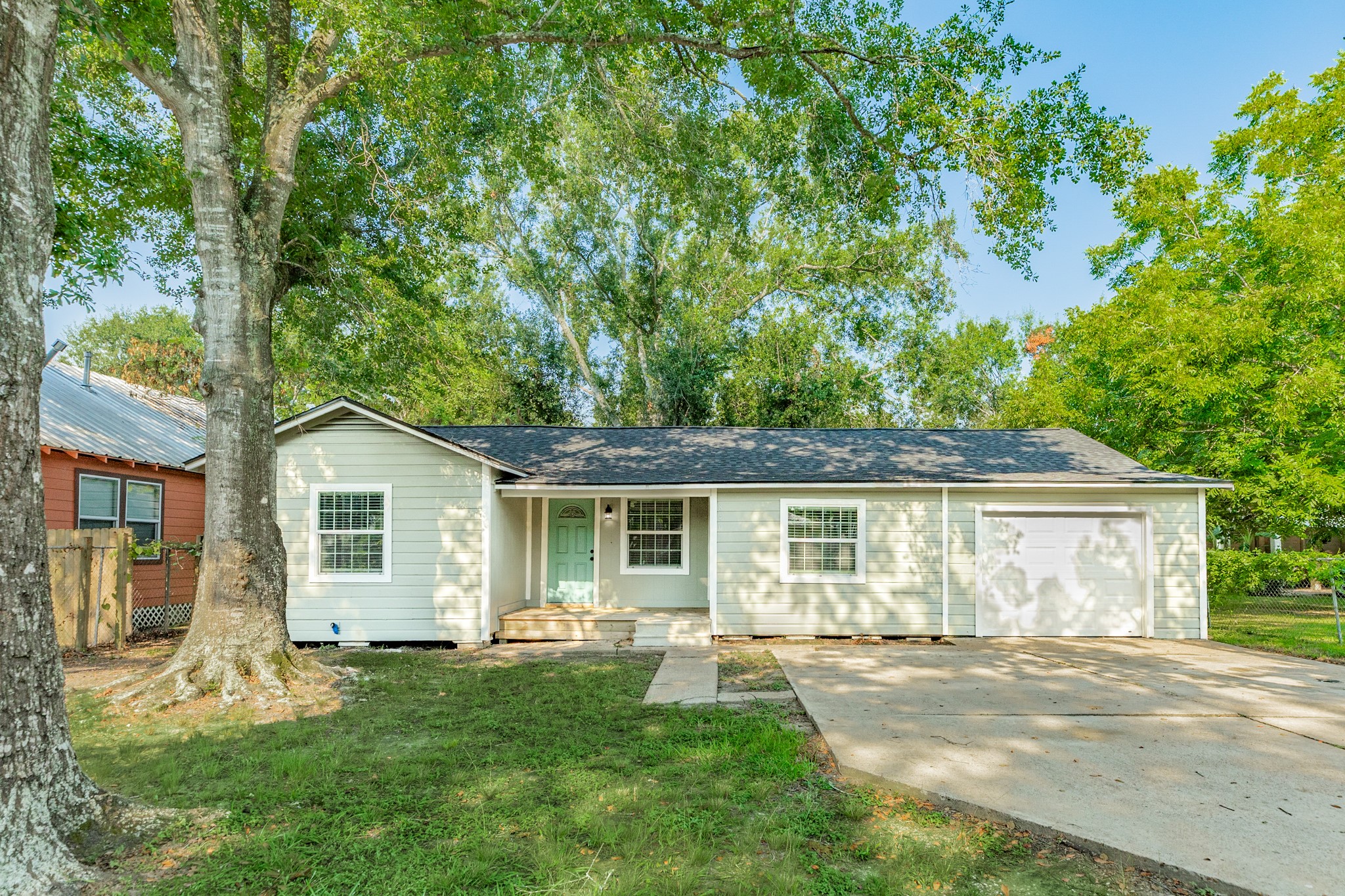 front view of a house and a yard