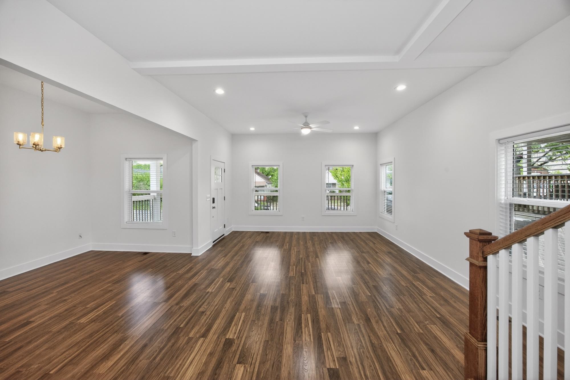 7 Decatur Street Nashville, TN 37210 - Photo 10 of 43 an empty room with wooden floor and windows