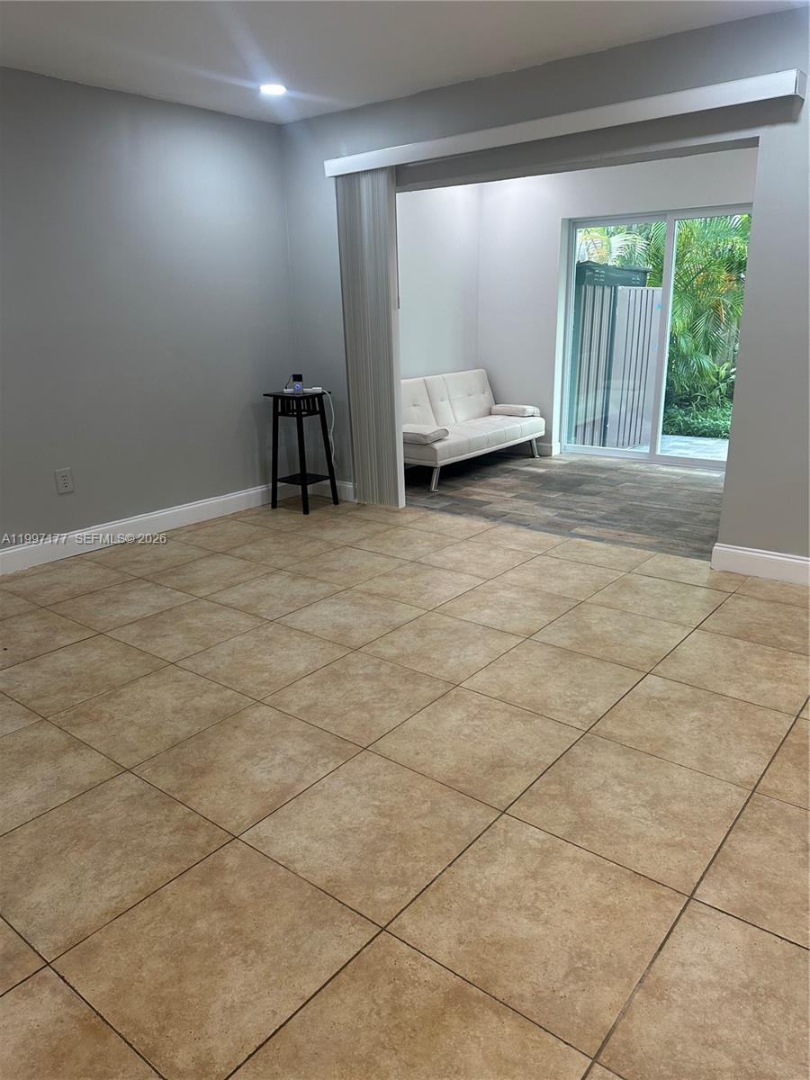 9724 Southwest 142nd Place Miami, FL 33186 - Photo 12 of 36 a view of a livingroom with furniture