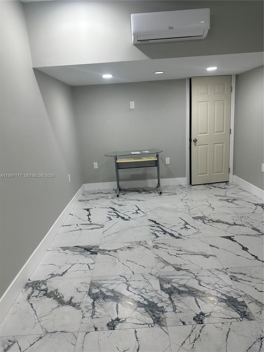 9724 Southwest 142nd Place Miami, FL 33186 - Photo 18 of 36 a view of a livingroom with an empty space