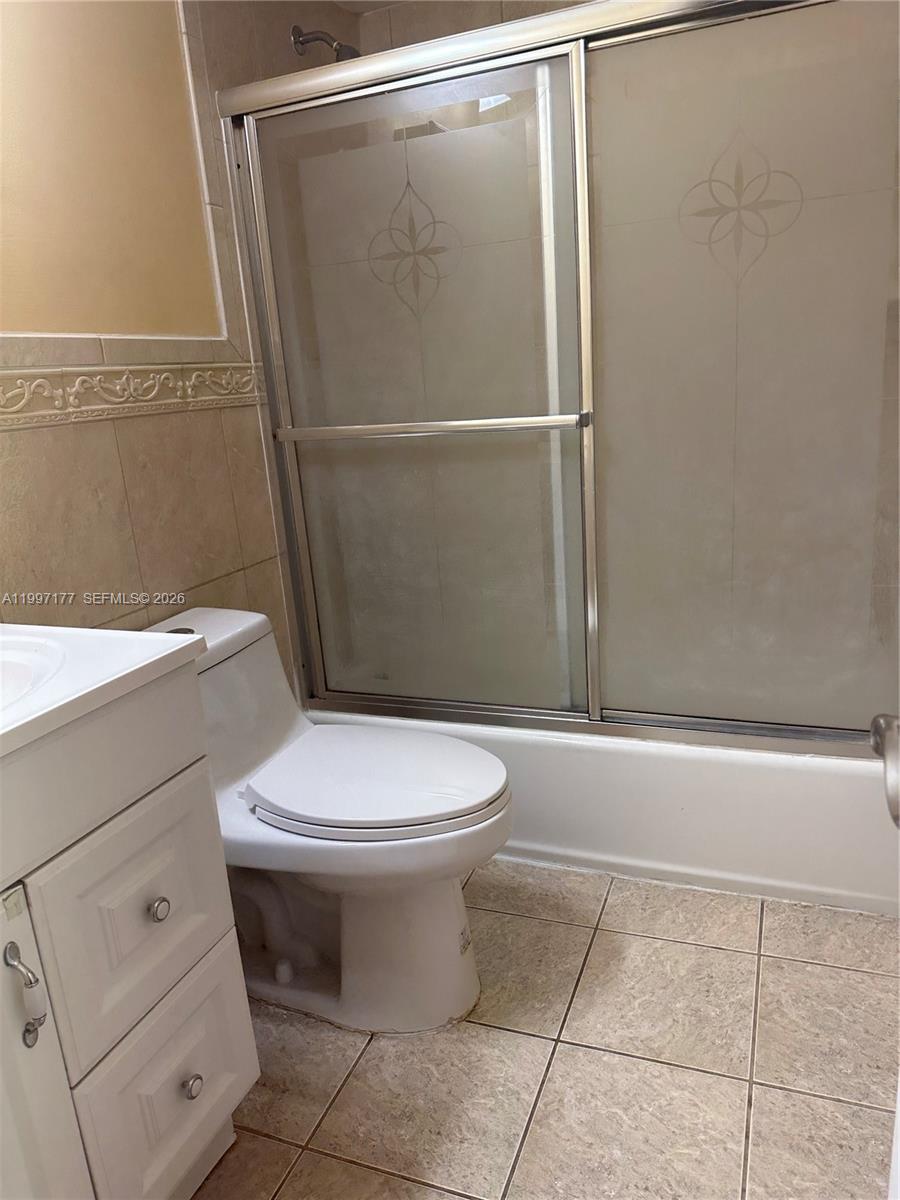 9724 Southwest 142nd Place Miami, FL 33186 - Photo 21 of 36 a bathroom with a toilet and a shower