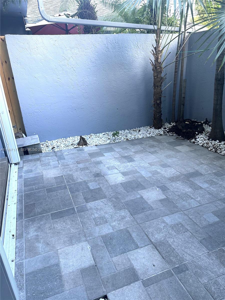 9724 Southwest 142nd Place Miami, FL 33186 - Photo 31 of 36 a view of a backyard