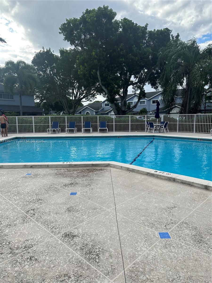 9724 Southwest 142nd Place Miami, FL 33186 - Photo 32 of 36 an outdoor space with garden view