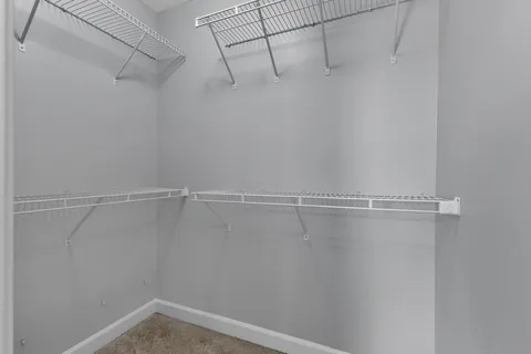 a view of a room with racks on the wall