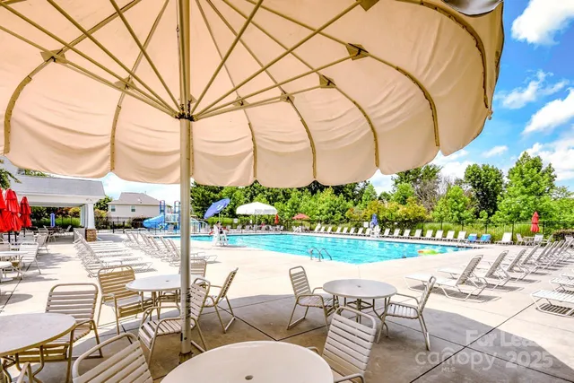 a view of an chairs and tables in the patio