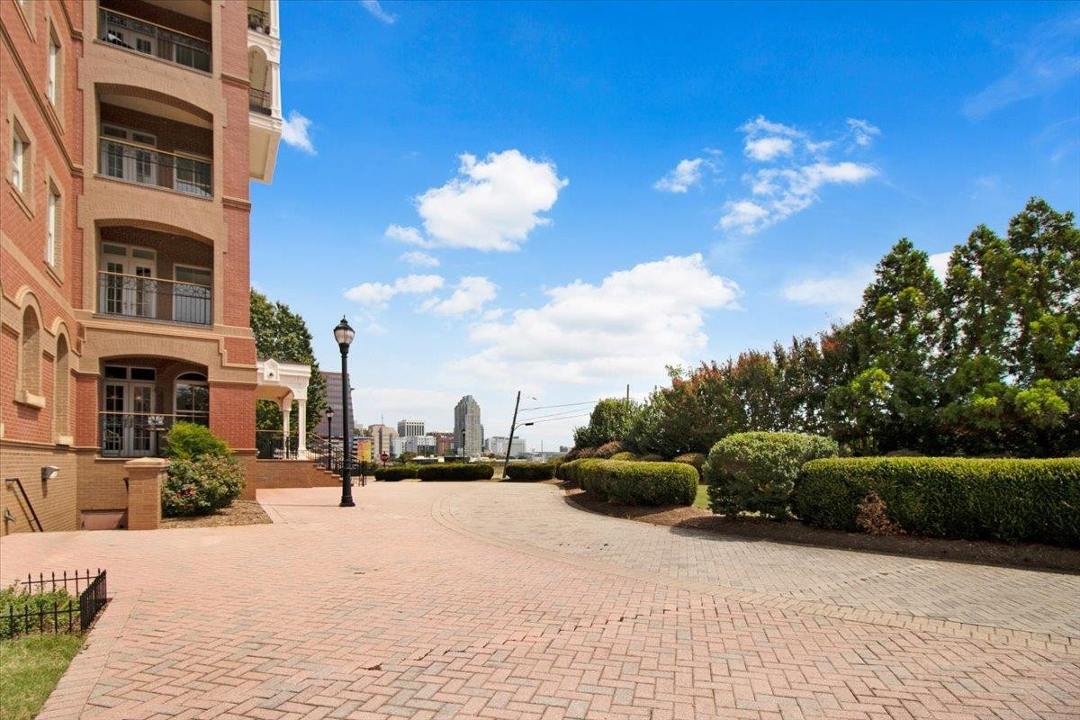 710 Independence Place, Unit 406 Raleigh, NC 27603 - Photo 3 of 50 a view of a street with a building in the background