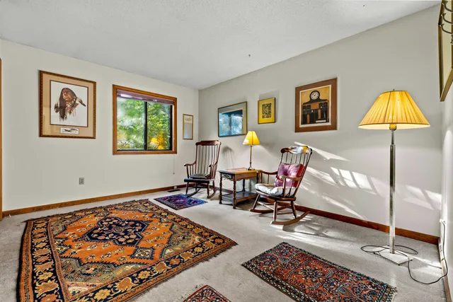 a living room with a couch and a table