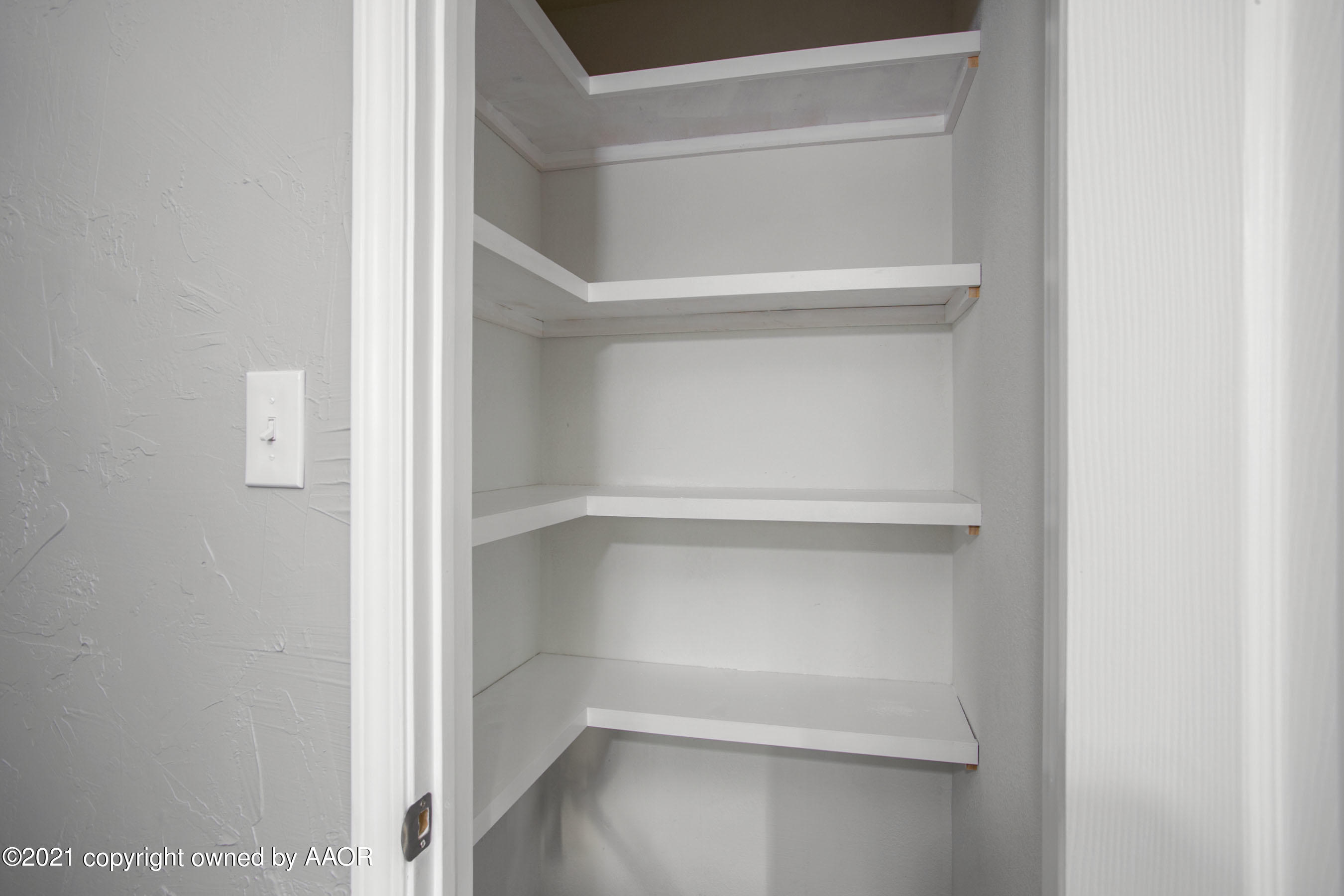 4622 South Rusk Street Amarillo, TX 79110 - Photo 11 of 22 a view of an empty walk in closet
