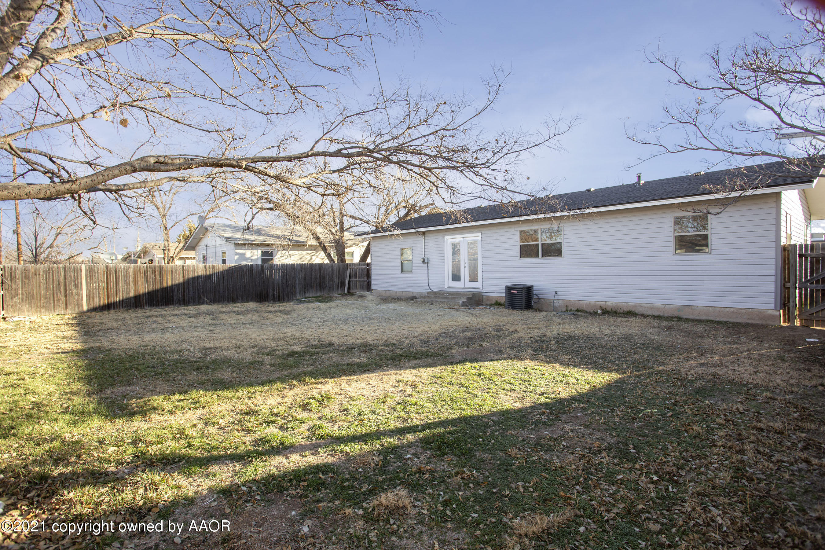 4622 South Rusk Street Amarillo, TX 79110 - Photo 20 of 22 a view of a house with a yard