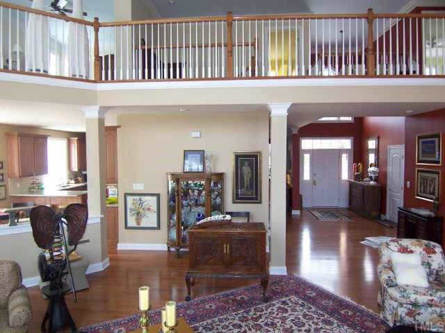 11715 Broadfield Court Raleigh, NC 27617 - Photo 3 of 12 Here is another view of the fantastic Family Room and Foyer. The hardwood floors and solid 3/4 inch hickory (not a laminate). Foyer