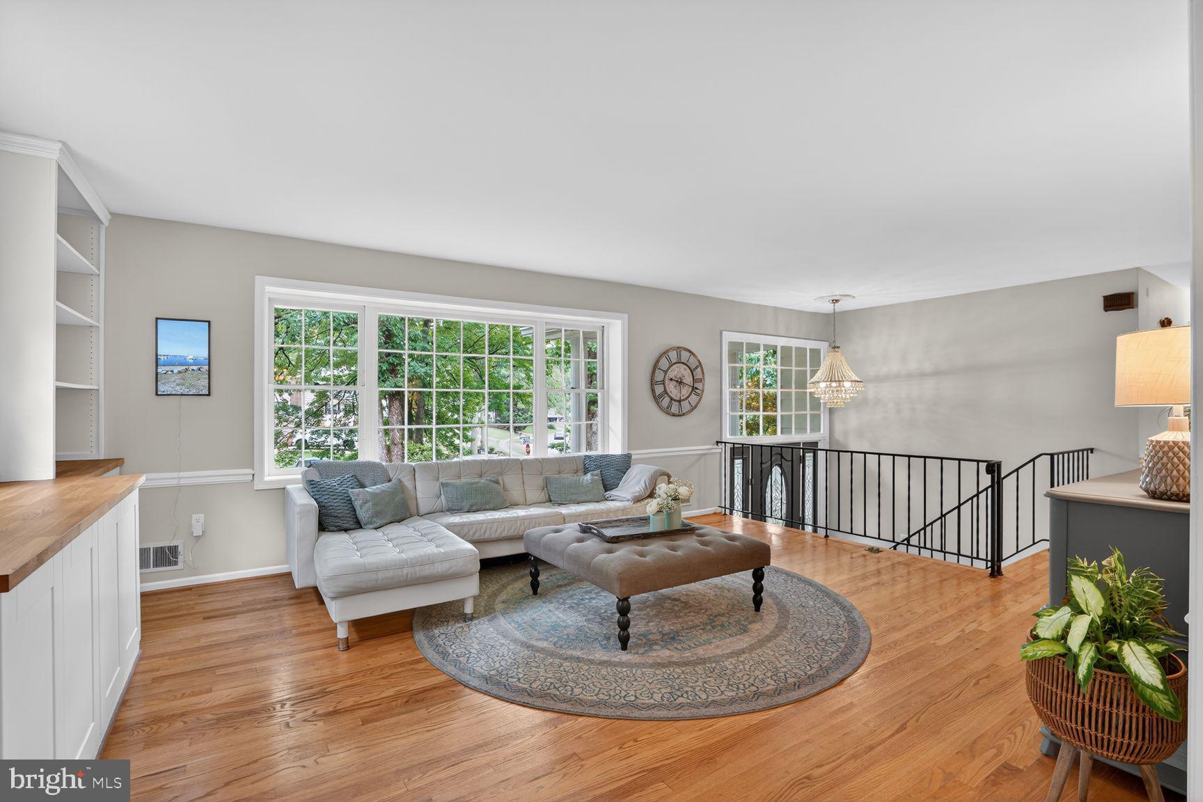 5024 Portsmouth Road Fairfax, VA 22032 - Photo 4 of 38 a living room with furniture and a large window
