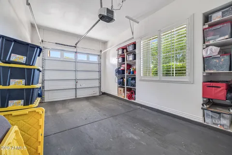 a kitchen with a sink a counter top space and cabinets