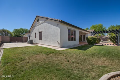 a view of a house with swimming pool
