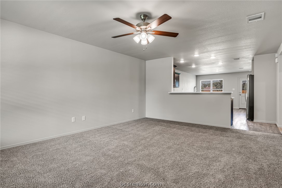 1635 Lucky Street Bryan, TX 77803 - Photo 2 of 11 an empty room with closet and windows