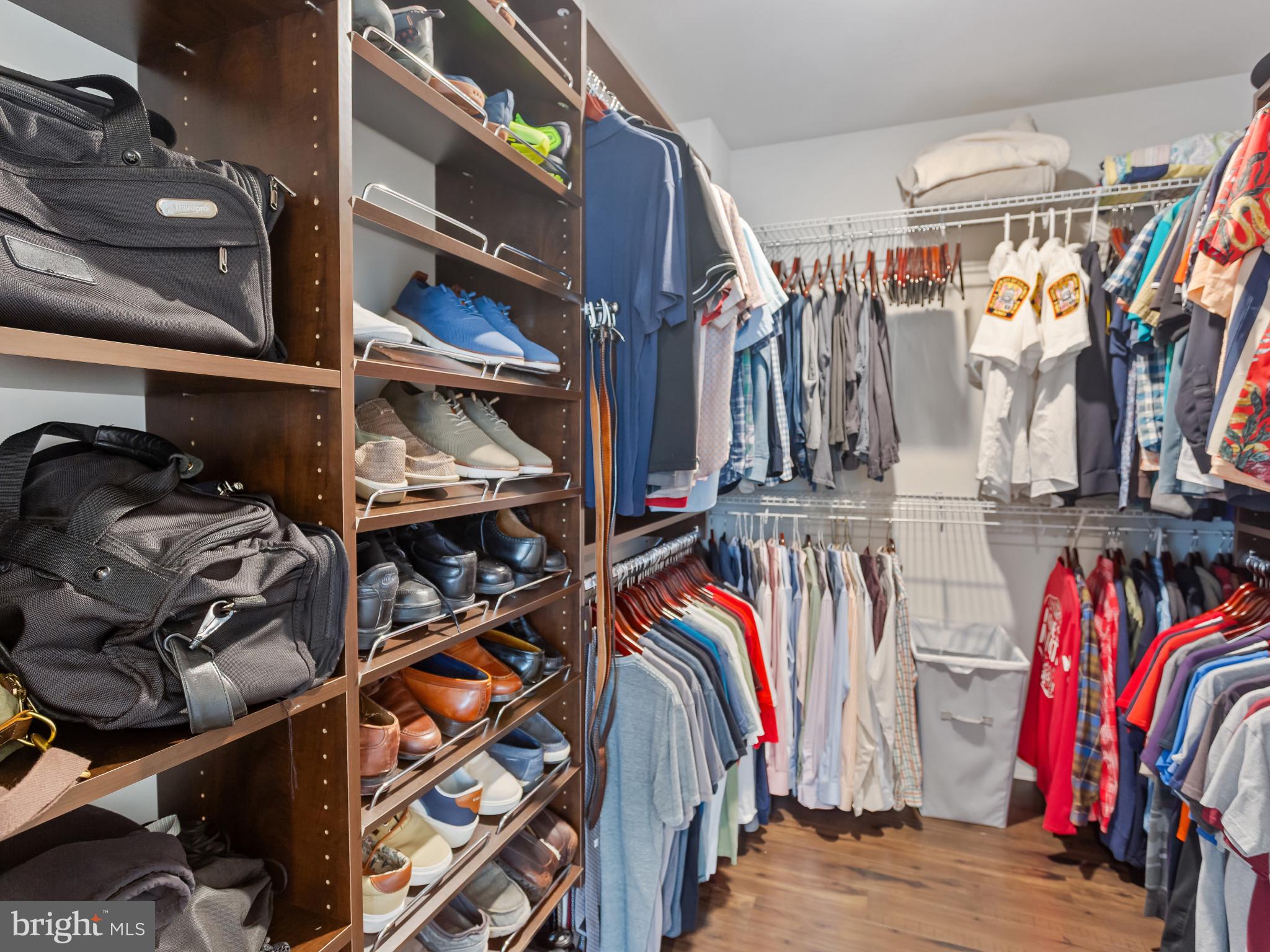 2762 Lady Slipper Road Gambrills, MD 21054 - Photo 21 of 43 a view of walk in closet with clothes and shoes