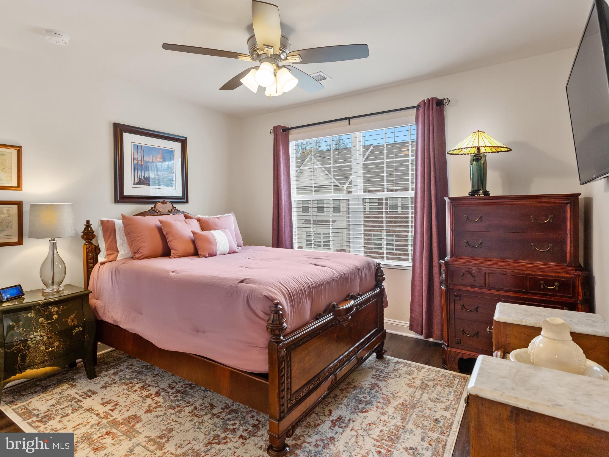 2762 Lady Slipper Road Gambrills, MD 21054 - Photo 22 of 43 a bedroom with a bed and a television