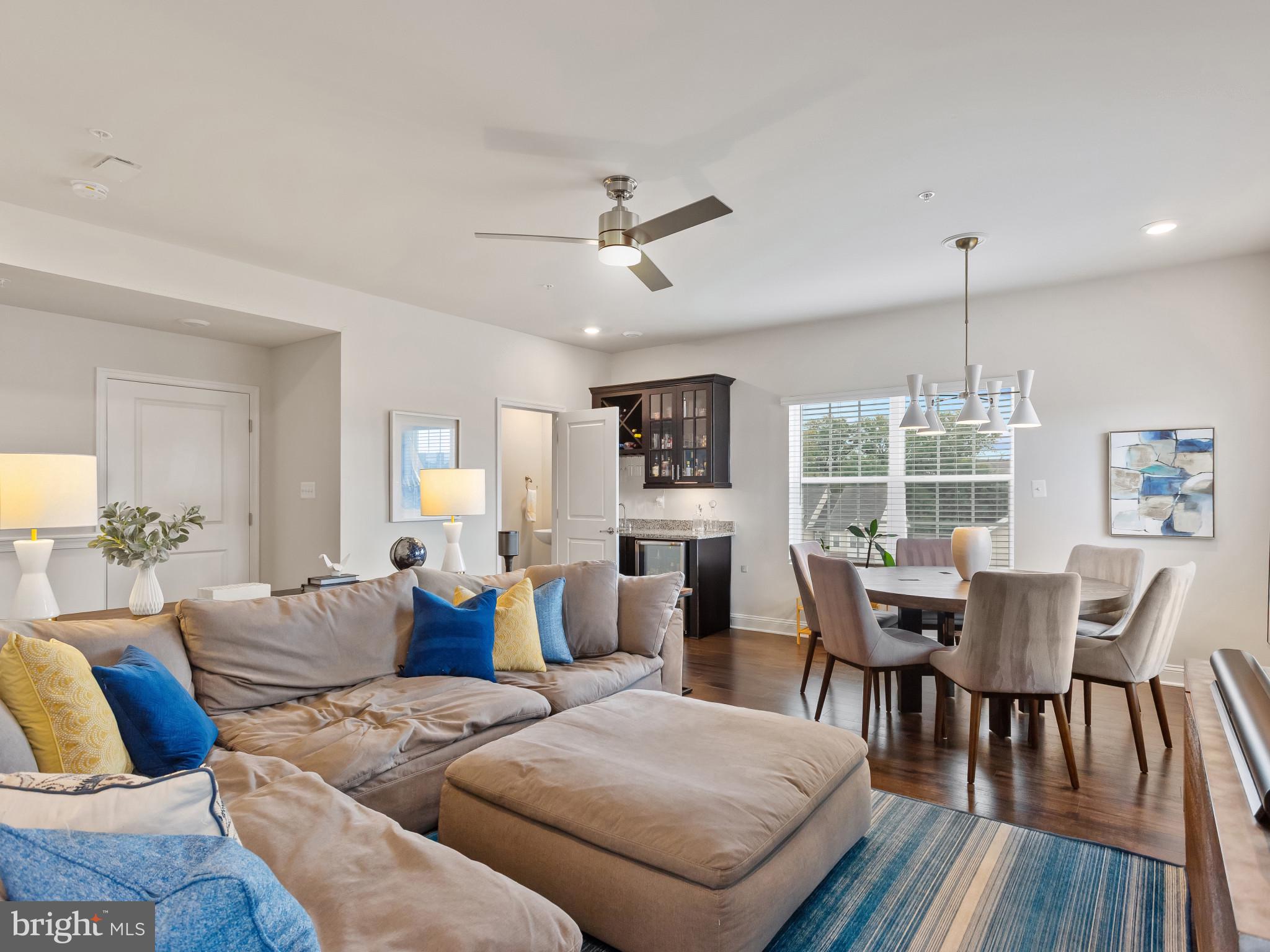 2762 Lady Slipper Road Gambrills, MD 21054 - Photo 26 of 43 a view of a dining room with furniture window and wooden floor