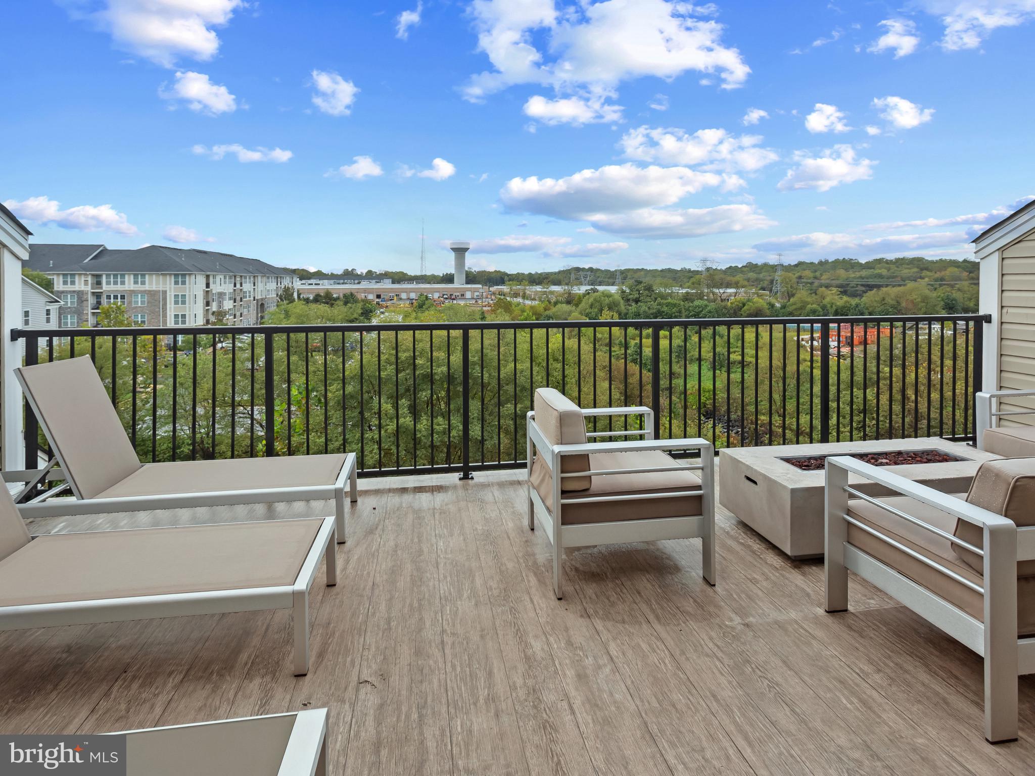 2762 Lady Slipper Road Gambrills, MD 21054 - Photo 29 of 43 a view of a terrace with couches and city view