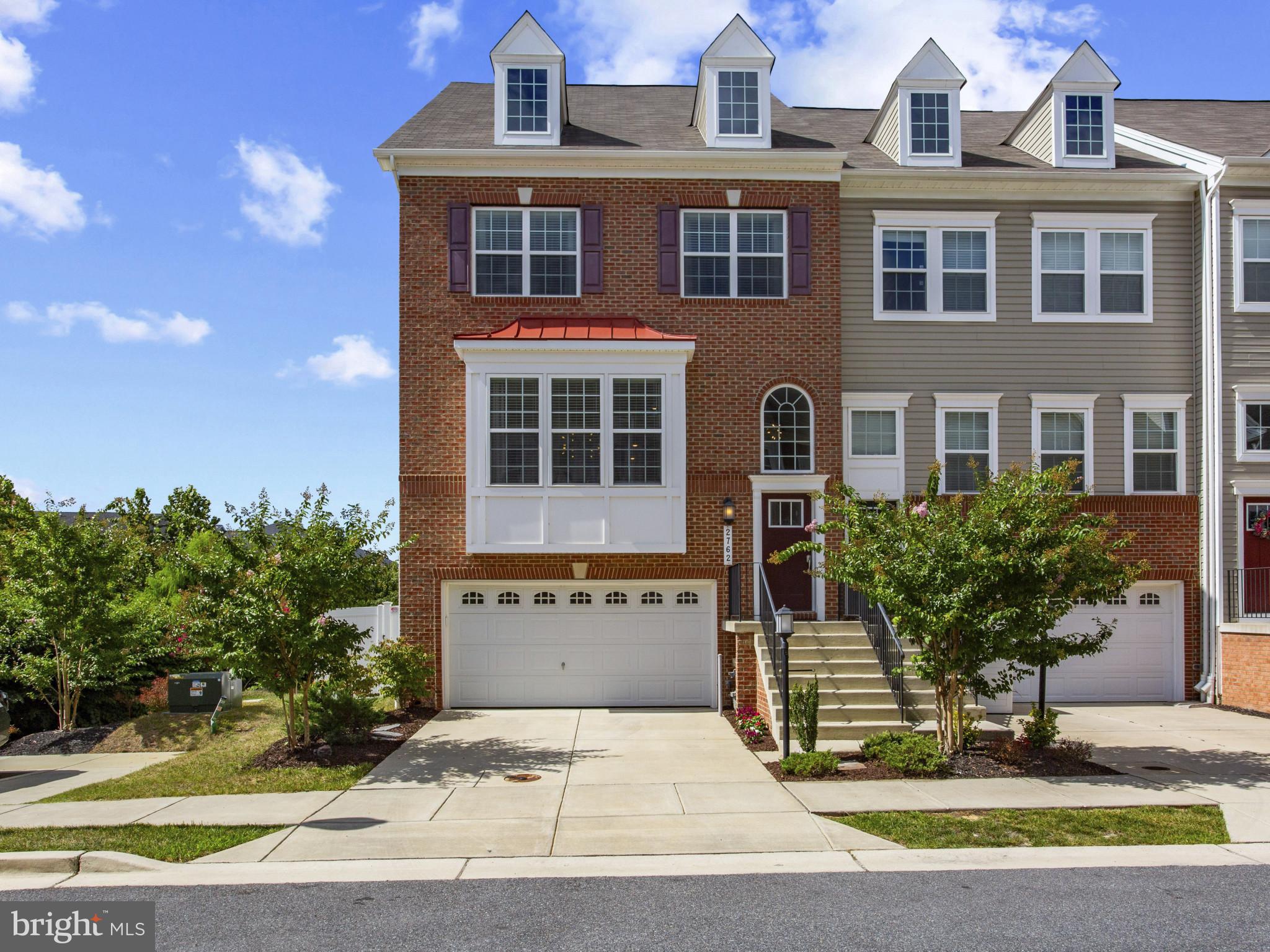 2762 Lady Slipper Road Gambrills, MD 21054 - Photo 38 of 43 a front view of a house with garden