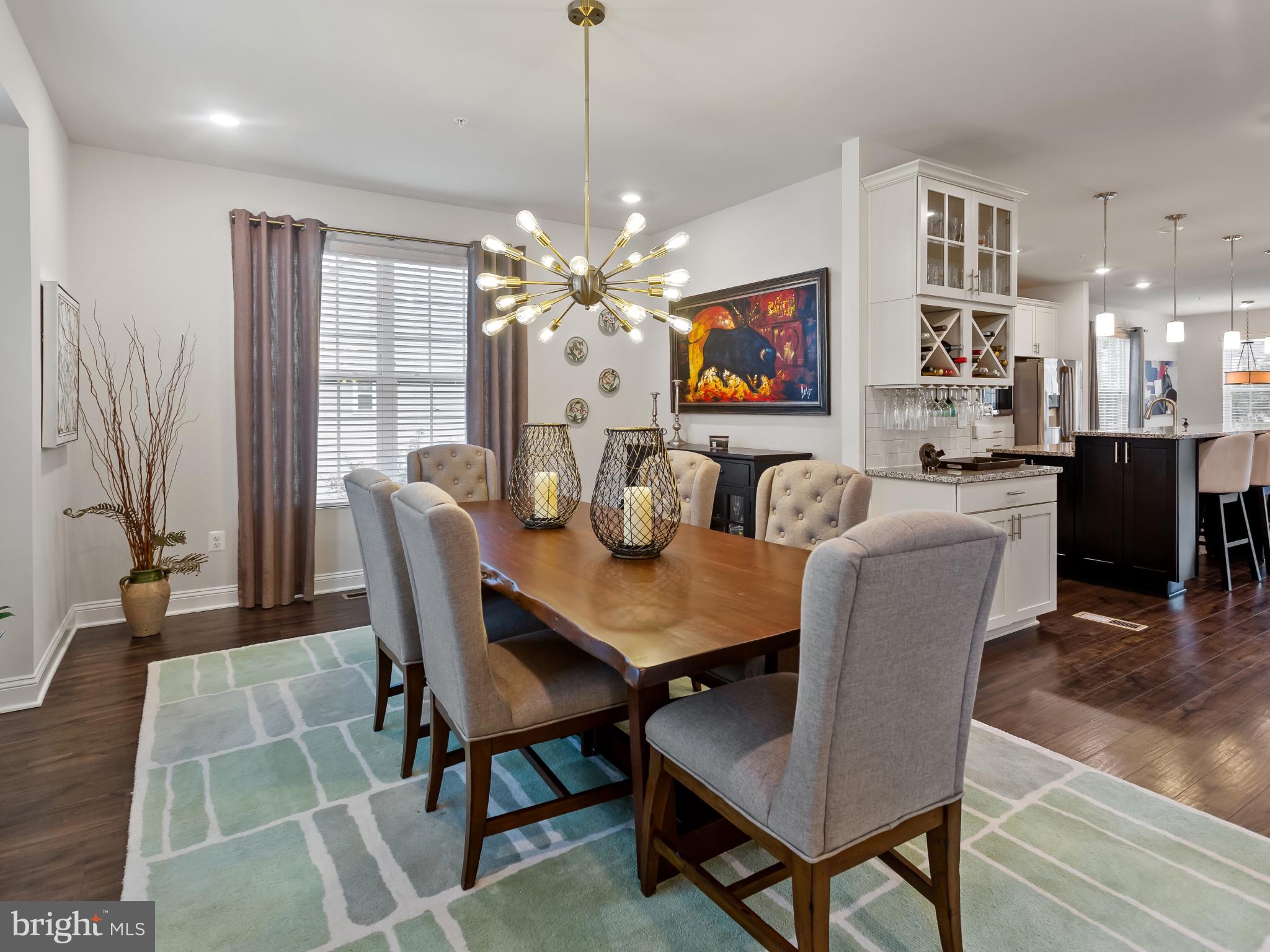 2762 Lady Slipper Road Gambrills, MD 21054 - Photo 8 of 43 a view of a dining room with furniture window and wooden floor