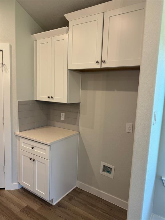 605 Finlee Way Tioga, TX 76271 - Photo 15 of 22 a view of cabinets and wooden floor